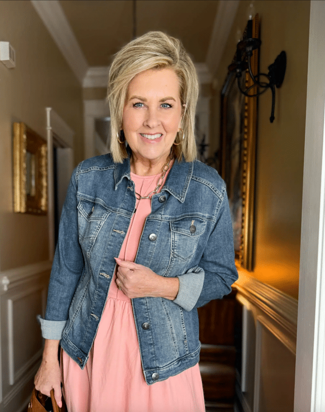 Tania wearing a Wrangler Denim Jacket with a pink dress