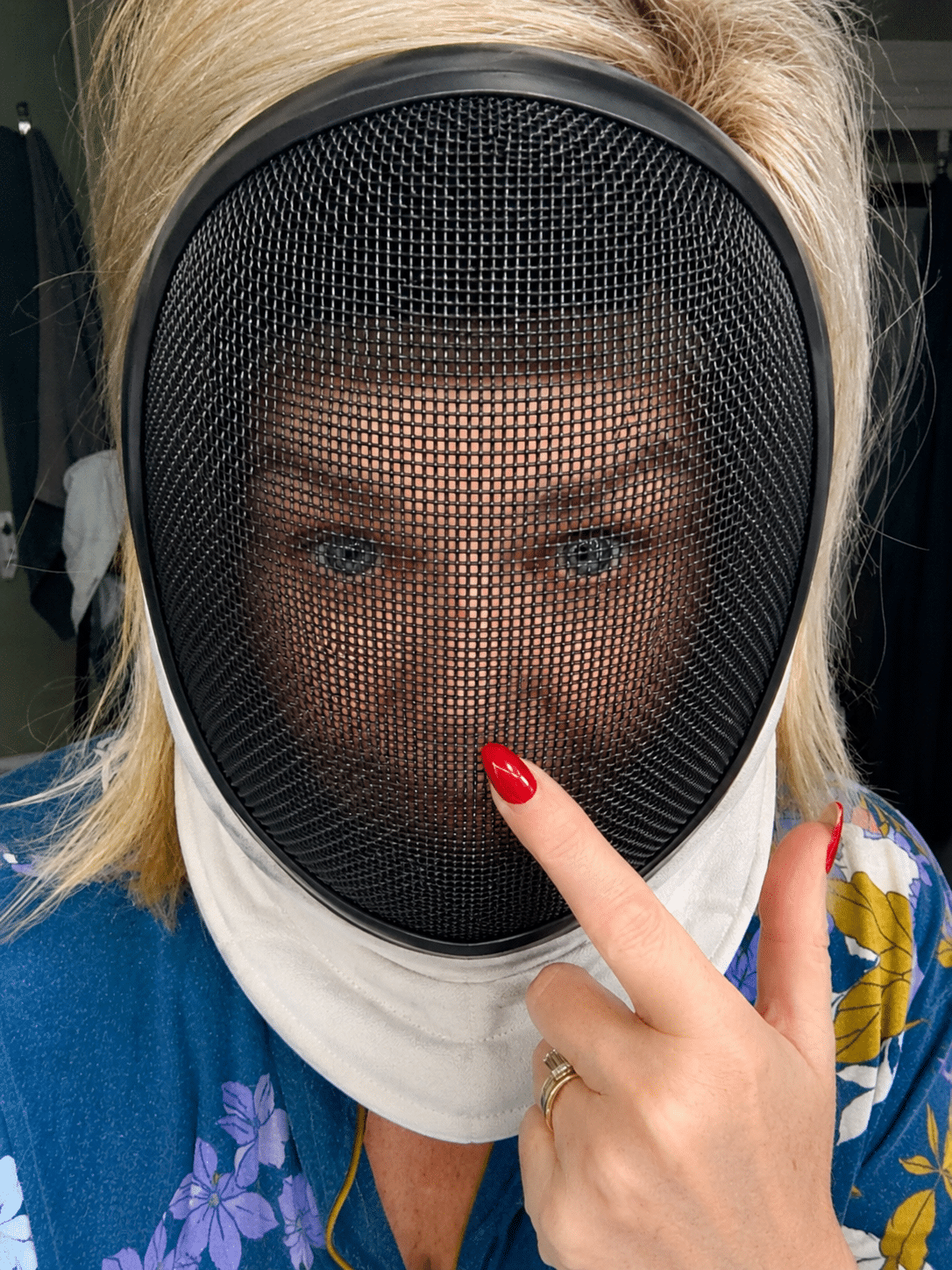 Tania in a fencing mask