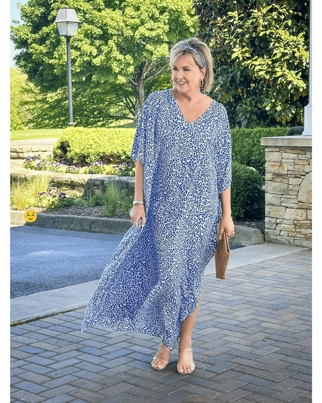 Over 50 Fashion Blogger, Tania Stephens is wearing a blue leopard Caftan