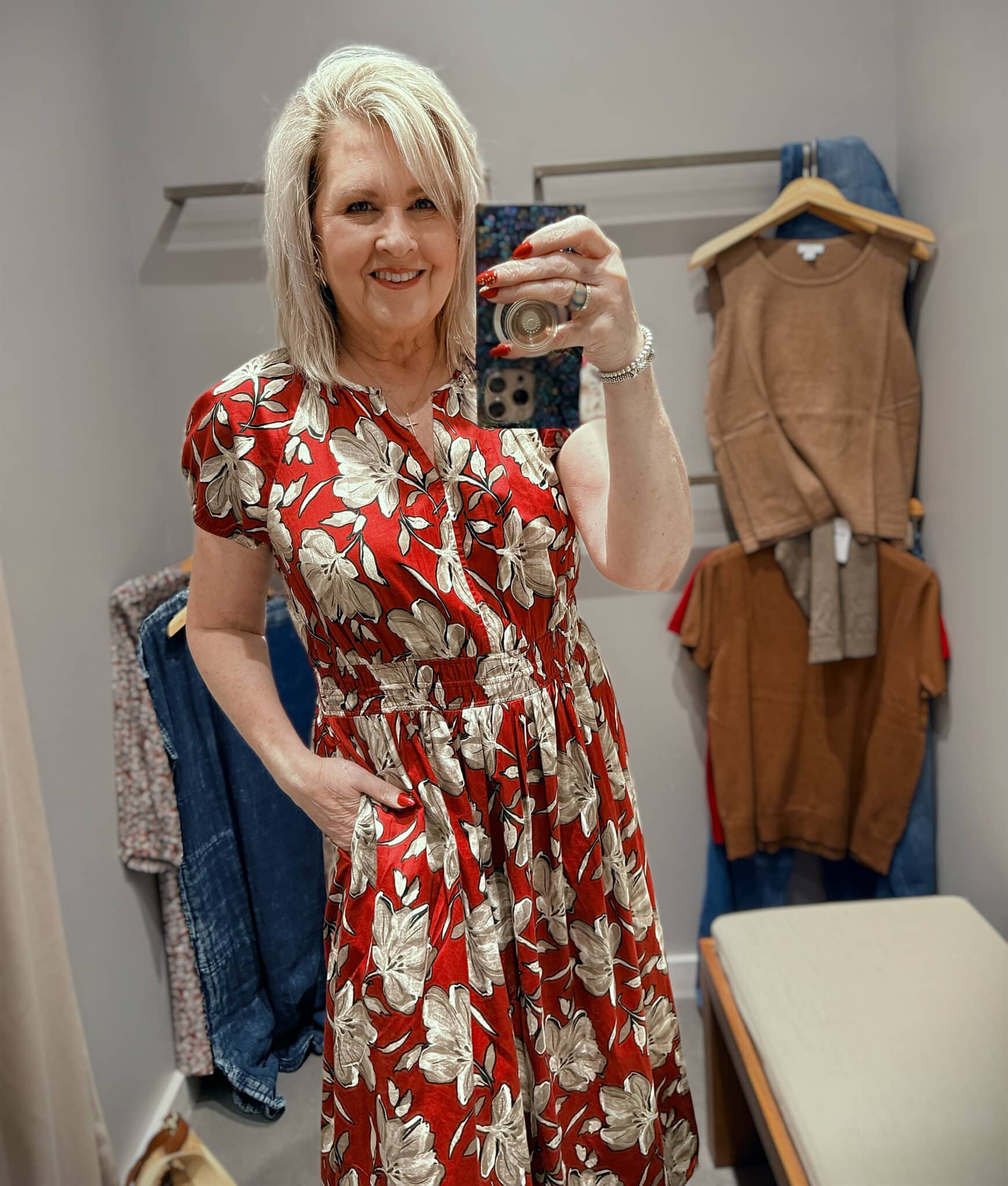 Tania in J.Jill wearing a smocked crimson floral print dress
