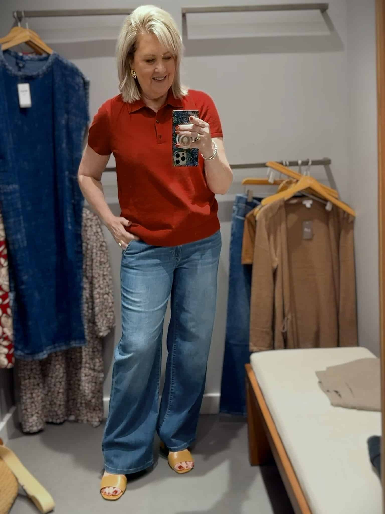 Tania in J.Jill wearing a crimson polo sweater and wide leg jeans